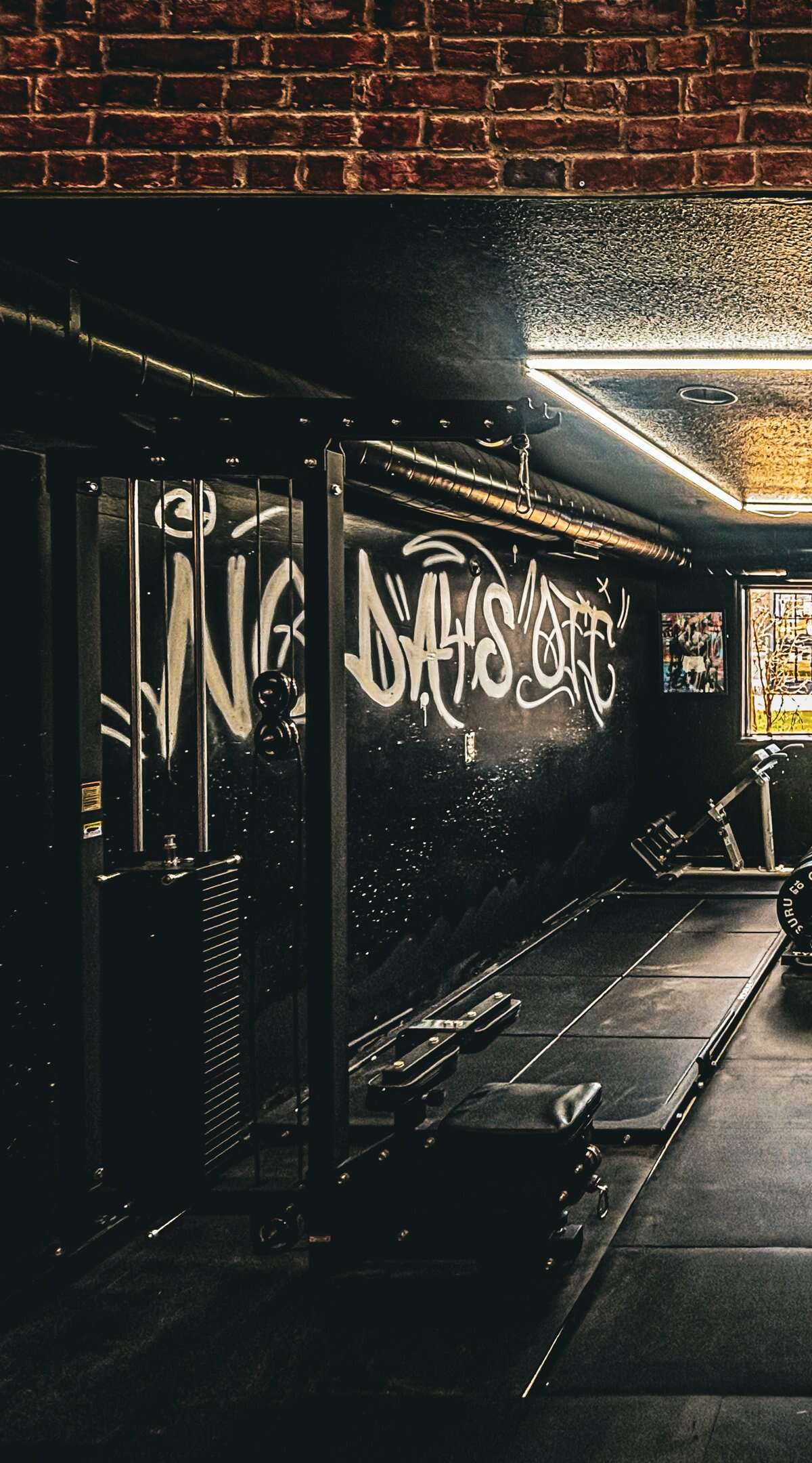 The machine room — No Days Off painted on the wall