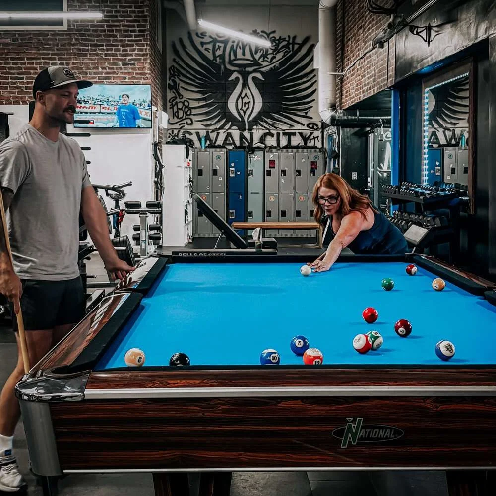 Members racking up at the pool table